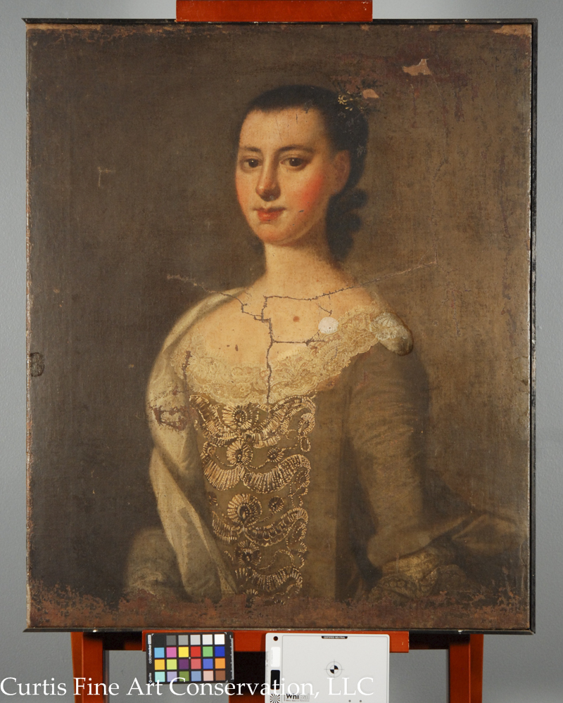 Jeremiah Theus, Portrait of Catherine DuTarque, c. 1774, oil on canvas. This portrait was coated with a synthetic resin varnish as well as a significant layer of yellowed wax resin from a lining during a previous restoration over 50 years ago.  At that time, the painting was stabilized and cleaned, but was not restored.